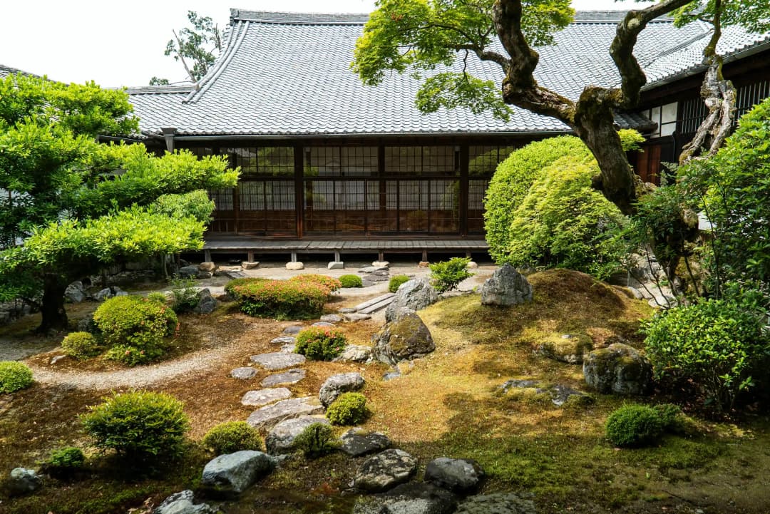 traditional Japanese house in Zen green garden