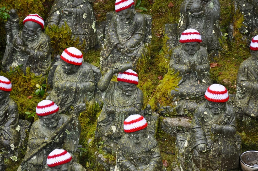 Stone Buddha Statues With Caps in Setonaikai National Park, Japan