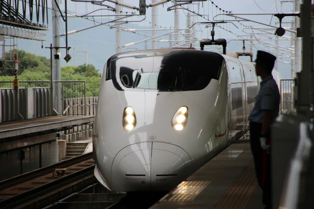 A Shinkansen arriving at a station